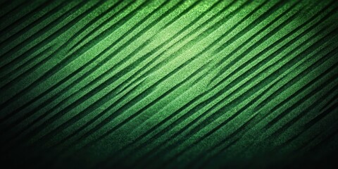 Obraz premium tranquil abstract green surface with diagonal ridges and grainy texture, shadowed lines creating rhythmic depth and calming mood