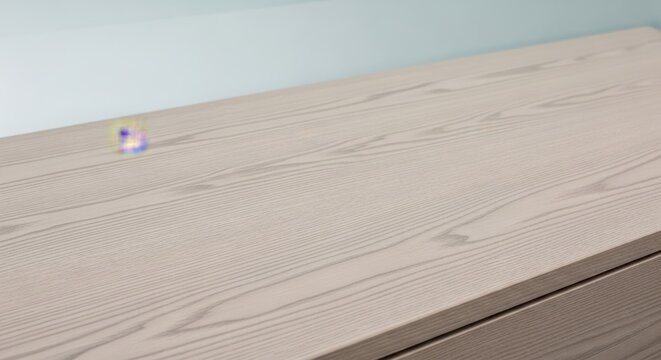 Light Ash Wood Surface with Subtle Pale Grey Veining and Natural Grain Texture