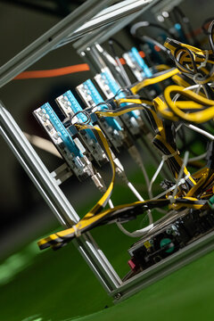 computer components in a metal cube structure