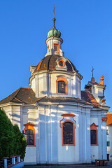 Obraz premium Church of St. Vaclav, Litomerice, Czech Republic. Side view of Baroque religious building under clear sky in daylight