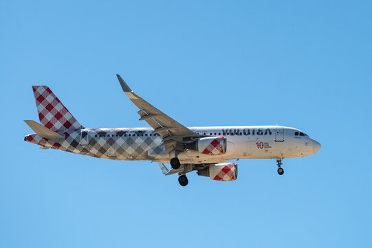 A Volotea airplane flying approaching for landing on 3rd of April of 2026, in Alicante, Spain.