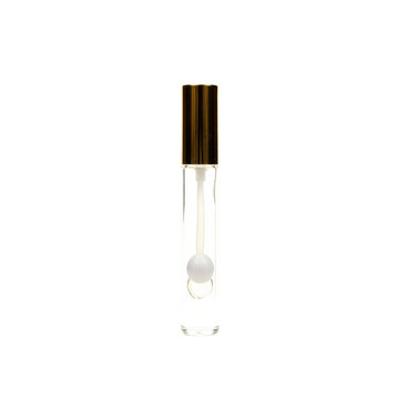 Perfume bottle glass Clear glass cosmetic bottle with a golden cap and white pearl inside cut out on a transparent background