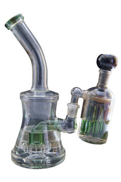 a small beaker type water bong with an ash catcher on a transparent background