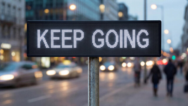 Keep going motivational perseverance concept representing determination resilience mindset and persistence for self improvement personal development goal achievement inspiration and mental strength