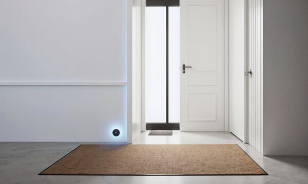 Smart home sensor door mat system installed in a minimalist contemporary foyer for home security and automation technology