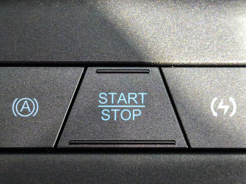 Modern Engine Start Stop Button on Luxury Car Dashboard Console