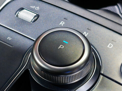 Modern Rotary Car Gear Shifter and Selector on Console