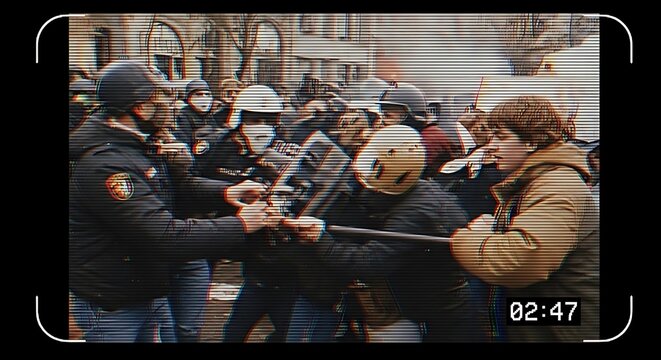 Police clash with protester in riot.
