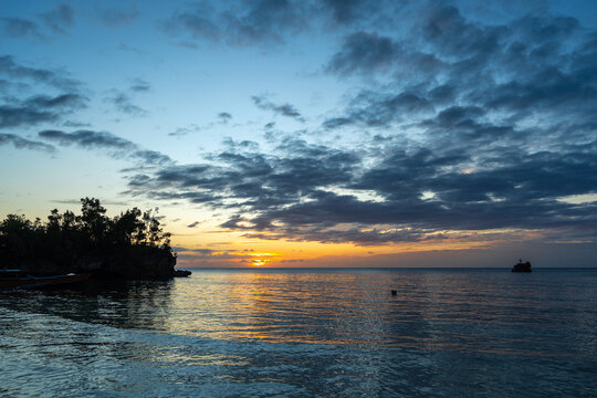 Sunset on Lia beach, Waleakodi Island, Togian archipelago, Sulawesi, Indonesia