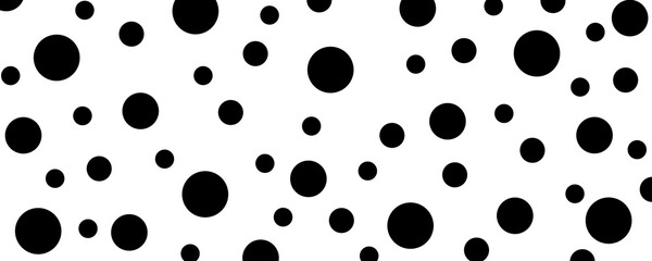 Random dots texture black. Big and small polka dot seamless pattern background. © Linda
