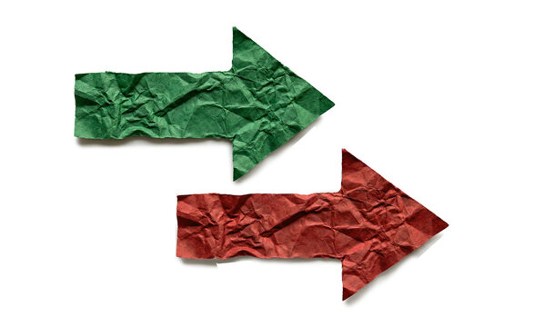 Green and Red crumpled paper arrow pointing right on isolated white background, sustainability concept,