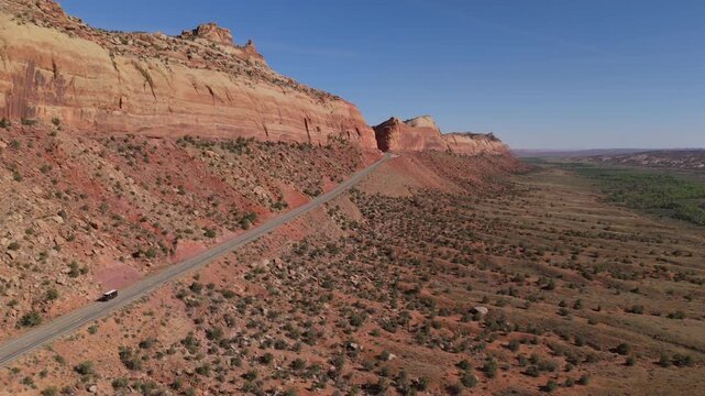 Scenic road up amazing 1000 foot fault zone in Utah red rock country, Combs ridge on Highway 95