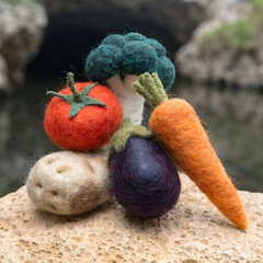 Fototapeta premium felt vegetable playset a macro shot of five artisan felt vegetables