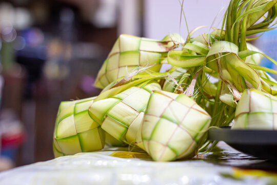 Freshly cooked Filipino puso rice, wrapped in coconut leaves. Puso, or hanging rice, is a traditional Filipino delicacy from Cebu and the Visayas region