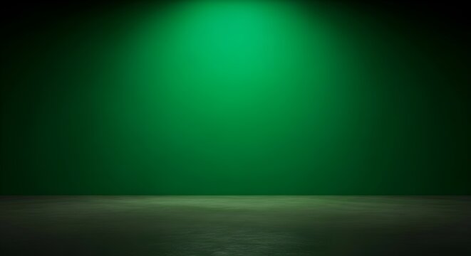 dramatic green spotlight on dark background with concrete floor