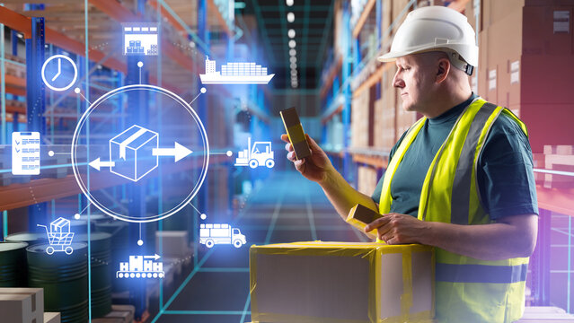 Logistics operations, warehouse management. Worker scans package and tracks supply chain data, managing inventory flow and digital distribution processes.