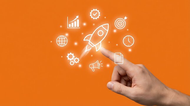 Hand pointing to creative startup rocket icons representing innovation and business growth on orange background