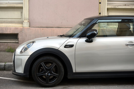 Mulhouse - France - 5 April 2026 - profile view of grey mini cooper D parked in the street