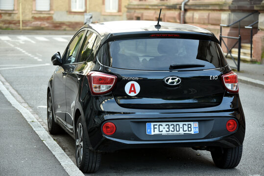 Mulhouse - France - 5 April 2026 - rear view of black hyundai I10 parked in the street