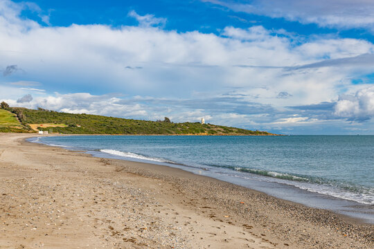 Coastal beach landscape with Carbonera lighthouse on Punta Mala, La Alcaidesa, Spain.