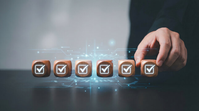 Hand placing final check mark block among completed tasks, workflow completion concept, productivity, project management, progress tracking, business success, goal achievement in modern workspace.