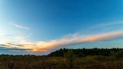 Obraz premium Sky with light clouds. Summer sky at sunrise or sunset.