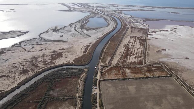 Footage of shallow lakes and deltas formed on the seashore, where rivers flow into the sea, called lagoons.