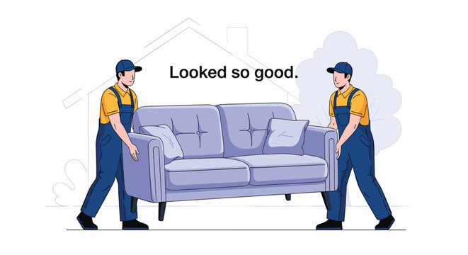 Two professional movers in work uniforms carefully carrying a large light blue sofa while moving furniture into a new home.