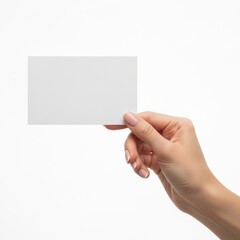 Obraz premium A hand holding a blank white card against a plain background