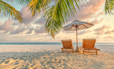 Breathtaking panoramic romantic beach sunset with elegant white sunbeds and umbrella, palm leaves framing calm ocean, dreamy relaxing tropical landscape stunning summer honeymoon vacation background