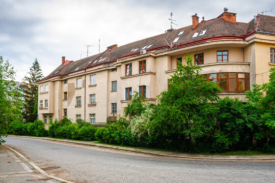 uzhhorod, ukraine - 03 jun 2012: urban scenery in summertime. view from hoidy street near park of st. tetyany with paved walkways. location near narodna square. cobbled street of uzhgorod city