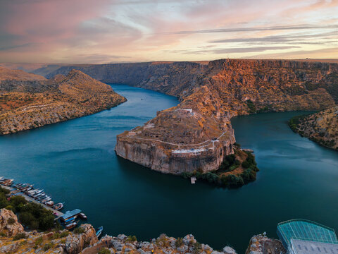 Rumkale fortress stands on cliffs at the confluence of the Euphrates River and Merzimen Stream in Nizip Gaziantep, T&uuml;rkiye, offering dramatic views and rich historical heritage.