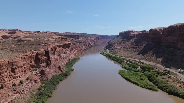 Fly over Colorado River and Scenic highway 128 in Moab Utah 