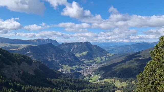Panorama of the town of Ortisei with the Monte Pic and Seceda mountains in the background.