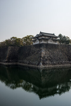Osaka Castle Turret and Stone Wall Reflection in Moat