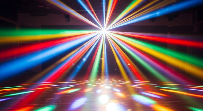 Vibrant laser light display illuminating a dark dance floor with dynamic beams of red, green, and blue, creating an energetic and captivating atmosphere for events.
