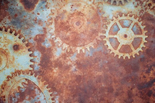 Rust orange rusty industrial metallic cog gear surface texture background