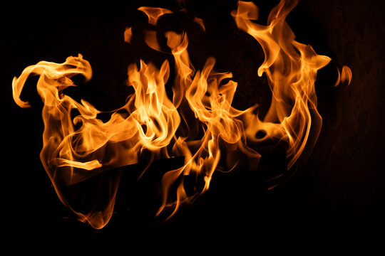 fire on a black background.Mockup for your logo. Wide angle horizontal wallpaper or web banner. flame effects for overlay designs or screen blending mode to make high.