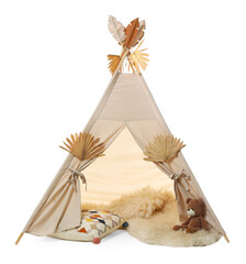 Stylish wigwam for child's room with pillow, rug and teddy bear isolated on white © New Africa