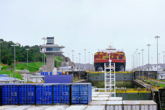 Large Cargo Container Ship Navigating Through The Panama Canal Locks