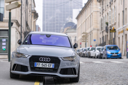 Nancy, France - January 2nd 2021 : View on a grey Audi RS6 Avant C7 finished in Nardo grey parked on a street with buildings in the background.