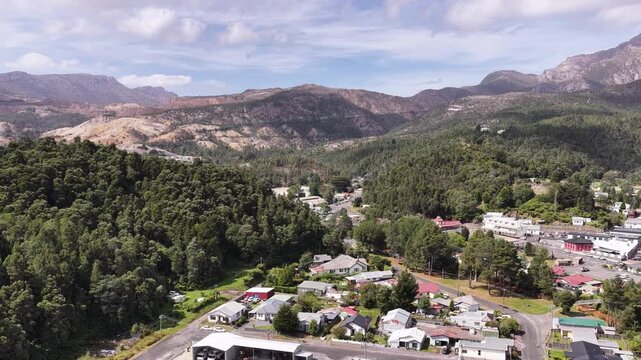 Downtown aerial panorama of Queenstown in West Coast mountains of Tasmania.