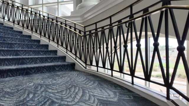 Elegant Carpeted Stairs Lead to VIP Event Space in Venue