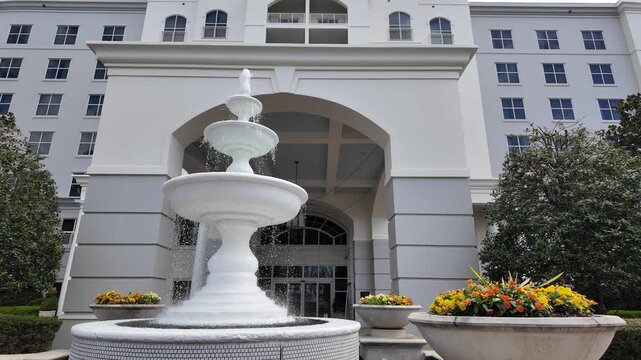 White Water Fountain Located at Large Building Entrance