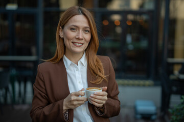 Professional woman enjoying coffee break happy smiling