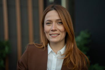 Professional woman smiling looking at camera