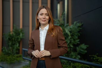 Professional woman standing outdoor in modern setting