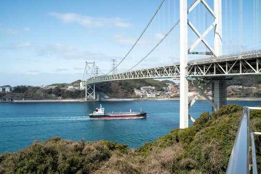 Ship Passing Beneath The Kanmon Bridge
