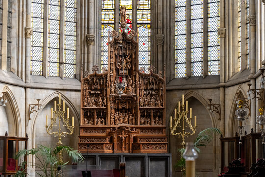 Tongeren, Belgium - 6 Apr 24: Carved wooden altar retable in church choir, Tongeren