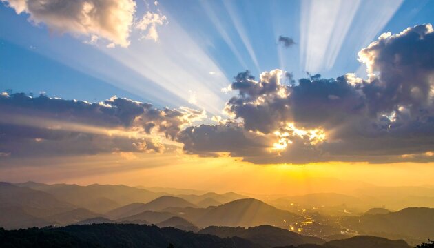 Dramatic sky with sun rays and clouds